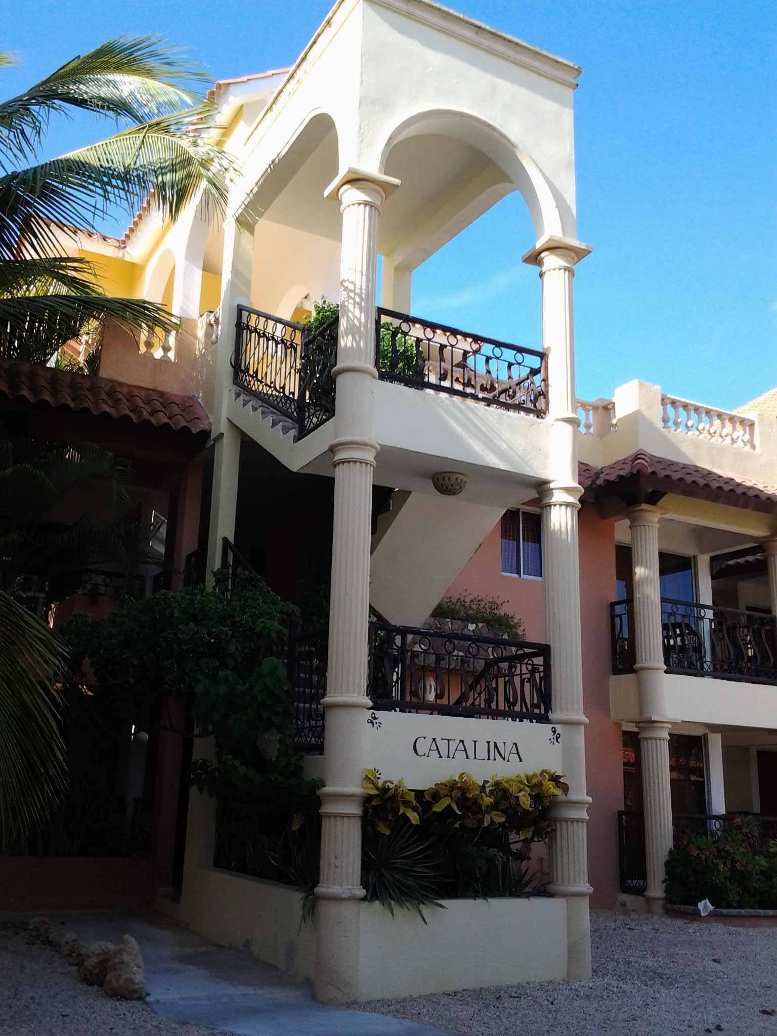 The Catalina building, with white columns and wrought-iron balconies